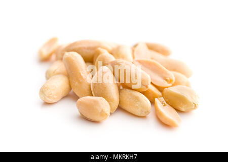 Salty roasted peanuts isolated on white background. Stock Photo