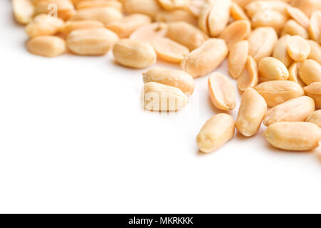 Salty roasted peanuts isolated on white background. Stock Photo