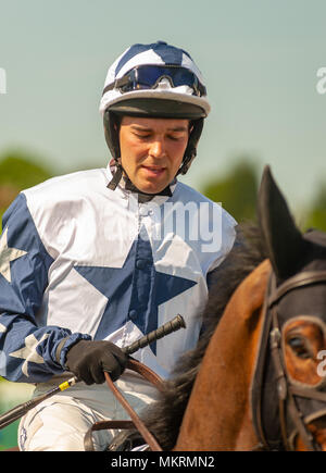 Jockey in white  with blue star and sleeves Eyton on Severn Point to Point 7th May 2018 Stock Photo