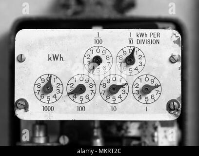 Dials on and old electricity meter Stock Photo