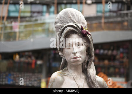 Bronze statue of Amy Winehouse at the Camden Stables Market, sculptured by Scott Eaton, Camden Town, London, UK. Stock Photo