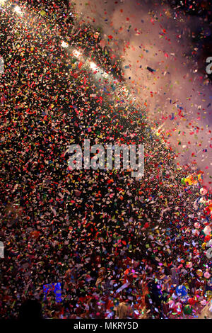 Thousands of balloons and confetti flying at the end of show Stock Photo