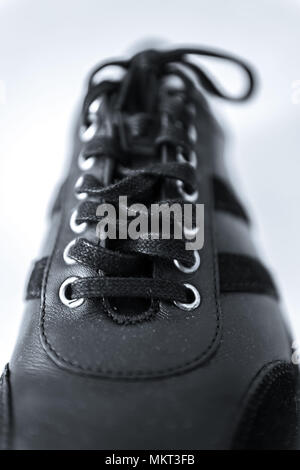 Macro shot of generic looking black shoe Stock Photo