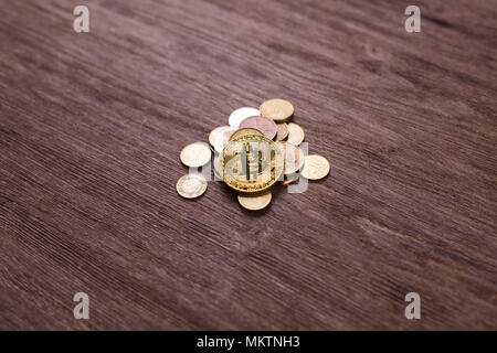 Bitcoin on coins of different countries . Digital payment system. Digital coin crypto money on bitcoin farm in digital cyberspace Stock Photo