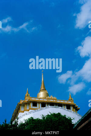 Golden Mount - Buddhist shrine of Wat Saket Ratcha Wora Maha Wihan Golden Mountain Temple in Bangkok in Thailand in Southeast Asia Far East. Sky Stock Photo