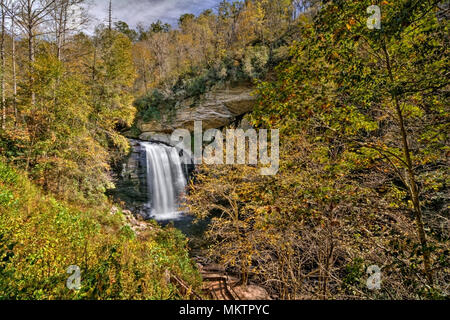 Looking Glass Falls is a scenic 60 foot waterfall in western North Carolina. Seen here in autumn. Stock Photo