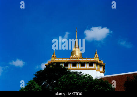 Golden Mount - Buddhist shrine of Wat Saket Ratcha Wora Maha Wihan Golden Mountain Temple in Bangkok in Thailand in Southeast Asia Far East. Sky Stock Photo