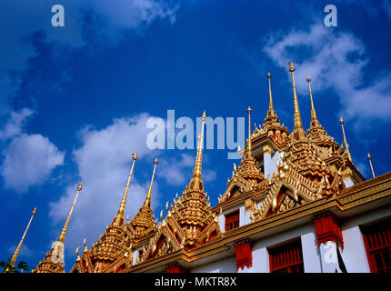 Spires of the Buddhist temple Loha Prasat Metal Castle of Wat Ratchanadda in Bangkok in Thailand in Southeast Asia Far East. Travel Holiday Site Stock Photo