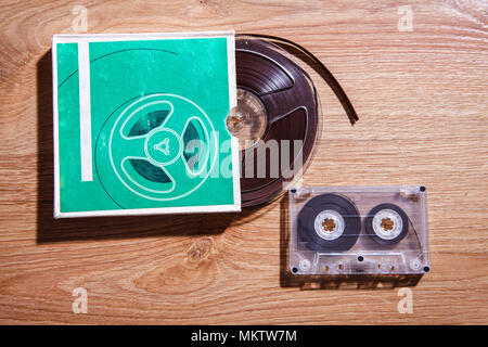 old tape in cardboard box and cassette onthe table Stock Photo