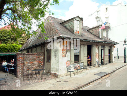 Constructed in the early 18th century, what is now Lafitte's Blacksmith Shop Bar on New Orlean's Bourbon Street is now a national hisdtoric landmark. Stock Photo