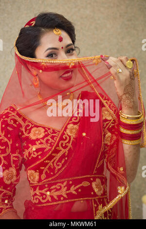 Beautiful Nepali Bride with wedding dress and make up at the wedding  ceremony in Nepal Stock Photo - Alamy