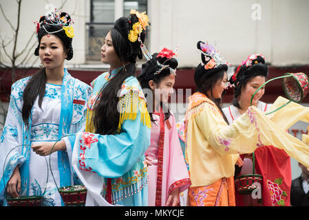 Paris, France.  Women on a parade float, as part of the Chinese New Year festival Stock Photo