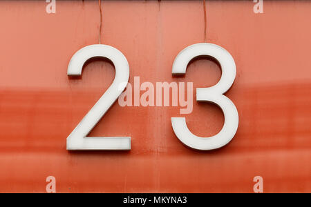 Number twenty three isolated on a red background. Stock Photo