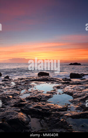 St Ives, Cornwall, UK. 9th May 2018. UK Weather.  A sailors sky at sunrise over the coast at St Ives in Cornwall heralds an end to the heatwave many people have enjoyed over the last few days. Credit David Forster/Alamy Live News Stock Photo