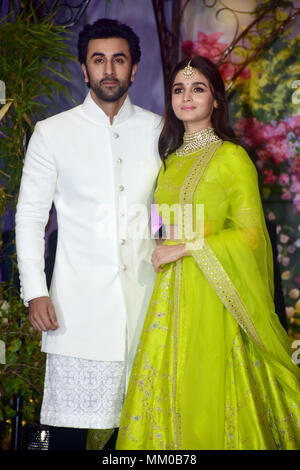 Indian film actor Ranbir Kapoor with actress Alia Bhatt attend the wedding reception of actress Sonam Kapoor and Anand Ahuja at hotel Leela in Mumbai. Stock Photo