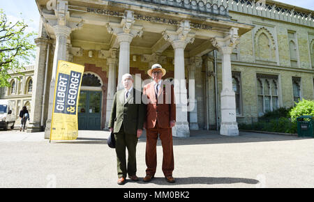 Brighton UK 9th May 2018 - Renowned artists Gilbert (left). and George visiting their own exhibition at Brighton Museum and Art Gallery which is showing until September until September .  Photograph taken by Simon Dack Stock Photo