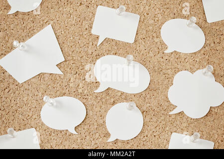 Speech bubbles on pinboard Stock Photo