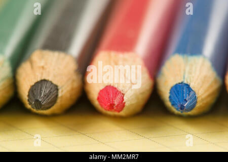 many sharp sharpened colored pencils close-up on the background Stock Photo