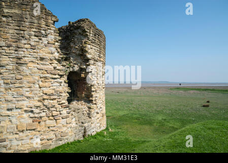 Ruins of Flint Castle beside the river Dee in Flintshire, North Wales. the circular 'Donjon' tower. Stock Photo