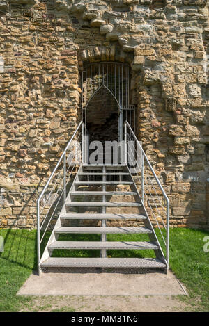 Ruins of Flint Castle beside the river Dee in Flintshire, North Wales. Steps leading into the North East tower. Stock Photo