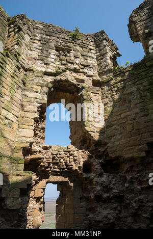 Ruins of Flint Castle beside the river Dee in Flintshire, North Wales. Window in the North East tower. Stock Photo