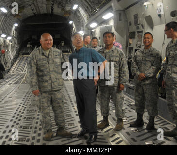 Governor of Hawaii, David Y. Ige, visited with a Hawaiʻi Air National Guard C-17 Globemaster III transport aircraft from the 204th Airlift Squadron, 154th Wing, before they departed Joint Base Pearl Harbor-Hickam early this morning as part of the nation’s Hurricane Harvey relief effort. The C-17, carrying two flight crews and maintenance personnel (16 Airmen in total) will initially fly to Memphis International Airport in Tennessee, from where they will transport relief supplies to the hurricane-damaged areas around Houston, Texas. Hurricane Harvey is one of the worst natural disasters in U.S. Stock Photo