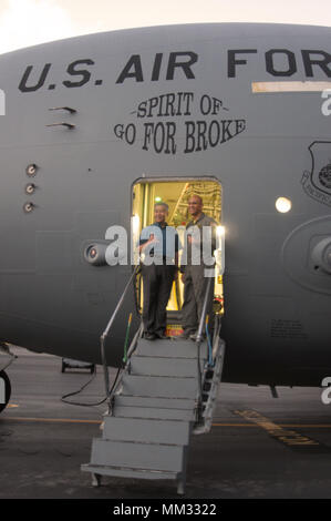 Governor of Hawaii, David Y. Ige, visited with a Hawaiʻi Air National Guard C-17 Globemaster III transport aircraft from the 204th Airlift Squadron, 154th Wing, before they departed Joint Base Pearl Harbor-Hickam early this morning as part of the nation’s Hurricane Harvey relief effort. The C-17, carrying two flight crews and maintenance personnel (16 Airmen in total) will initially fly to Memphis International Airport in Tennessee, from where they will transport relief supplies to the hurricane-damaged areas around Houston, Texas. Hurricane Harvey is one of the worst natural disasters in U.S. Stock Photo