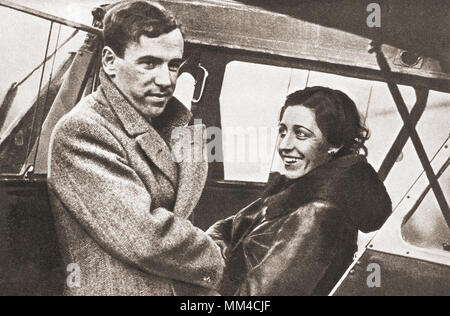 Amy Johnson says farewell to her husband, Jim Mollison, before taking off on her successful attempt to establish a new record to the Cape in 1932. Amy Johnson, 1903 – 1941.  Pioneering English aviator who was the first female pilot to fly alone from Britain to Australia.  From The Pageant of the Century, published 1934 Stock Photo