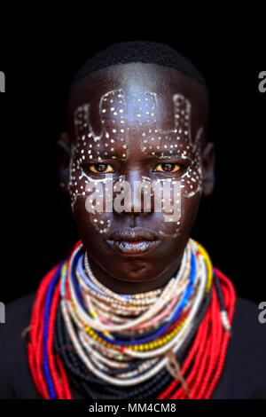 A Portrait Of A Young Woman From The Karo Tribe, Omo Valley, Ethiopia. Stock Photo