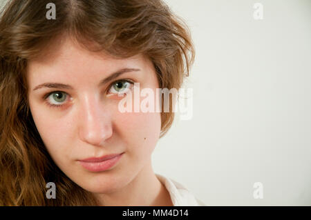 Portrait of young woman looking at the camera. Close view. Stock Photo
