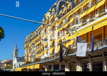 Montreux, Switzerland - October 18, 2017: The facade of the famous Montreux Palace hotel in the center of the spa town on the shore of the Geneva lake Stock Photo
