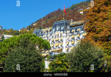 Montreux, Switzerland - October 18, 2017: The facade of the famous Montreux Palace hotel in the center of the spa town on the shore of the Geneva lake Stock Photo
