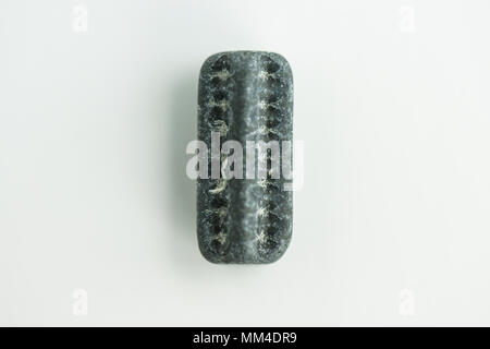 A star-shaped crinoid stem fossil found on the Jurassic Coast Stock Photo -  Alamy