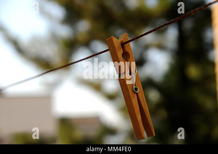 Peg on a wire closeup Stock Photo
