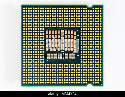 Electrical contacts on the backside of Intel Q6600 CPU (Central Processing Unit). Stock Photo