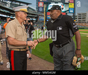 Umpires Laz Diaz and Mike Estabrook (L) comment to St. Louis Cardinals  manager Mike Matheny about the blue uniforms before a game against the  Milwaukee Brewers at Busch Stadium in St. Louis