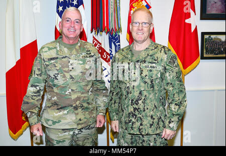 From left, Brig. Gen. Eugene J. LeBoeuf, acting Commander of U.S. Army Africa, and Rear Adm. Frank D. Whitworth, Director of Intelligence U.S. Africa Command, pose for a photograph in the USARAF commander's office during a recent visit to Caserma Ederle, Vicenza, Italy Sept. 6, 2017. (Photo by U.S. Army Visual Information Specialist Davide Dalla Massara/Released) Stock Photo