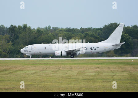 Boeing P-8 Poseidon is a twin-engine maritime patrol aircraft developed for the United States Navy from the Boeing 737-800 airframe. Wright-Patterson Air Force Base is a United States Air Force installation in Ohio. The archival image records a P-8 taxiing on Sept. 8, 2017, as part of safe haven operations during Hurricane Irma. Stock Photo