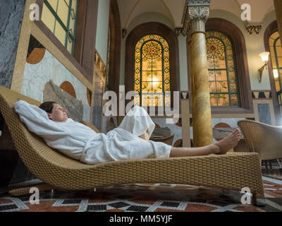Woman relaxing in heath spa of Palais-Thermal of Bad Wildbad, Baden-Württemberg, Germany Stock Photo
