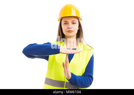 Young female engineer or architect making time out gesture as working pause break time concept isolated on white background Stock Photo