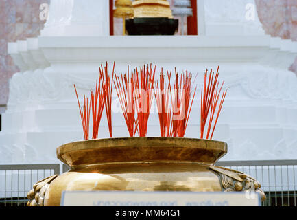 Incense sticks at the Trimurti statue God of Love at Central World in Bangkok in Thailand in Southeast Asia Far East. Religion Religious Travel Stock Photo