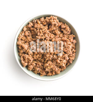 The chocolate granola breakfast cereals in bowl isolated on white background. Stock Photo
