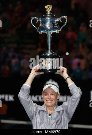 Danish tennis player Caroline Wozniacki poses with the championship trophy after winning women's singles final match in Australian Open 2018 Tennis To Stock Photo