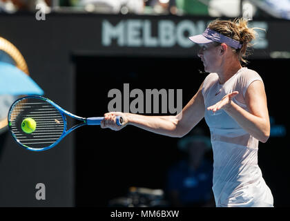 Russian tennis player Maria Sharapova  playing forehand shot in Australian Open 2018 Tennis Tournament, Melbourne Park, Melbourne, Victoria, Australia Stock Photo