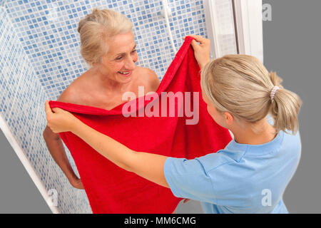 ELDERLY PERSON WASH Stock Photo