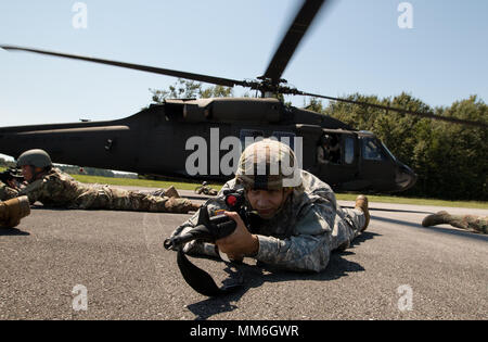 Alabama National Guard 1-173 Infantry Soldiers train to perform a squad attack on an airfield from a Blackhawk UH-60 in Foley, Alabama, on Sept. 9, 2017. Stock Photo