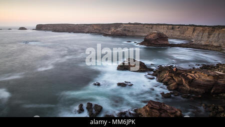 wild coast at sunset in portugal algarve Stock Photo