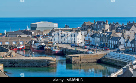 MACDUFF ABERDEENSHIRE SCOTLAND SHIPYARD OR BOATYARD VIEW OF TOWN AND HARBOUR SHOPS AND MAIN ROAD Stock Photo