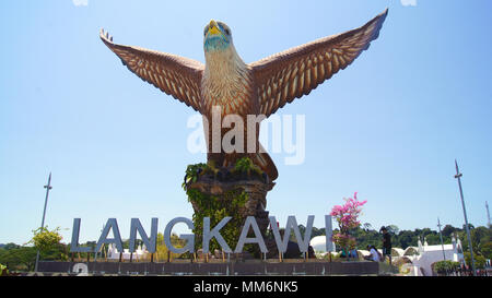 PULAU LANGKAWI, MALAYSIA - APR 7th 2015: The Eagle sculpture symbol of Langkawi island. Situated on Eagle Square in Kuah town, this place that reflect Stock Photo