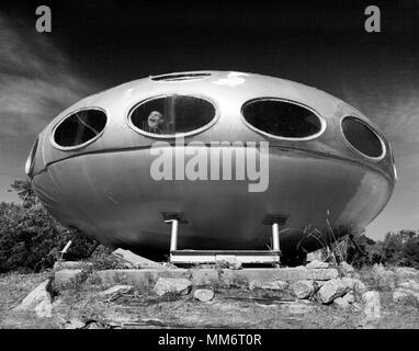 This 'UFO' is one of the few remaining Futuro Houses , a product of post-war Finland, designed by Matti Suuronen as a ski cabin. Frisco, NC USA. Stock Photo